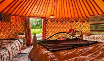 1, 2 or 3 Nights Glamping for up to 4 People in a Yurt with Breakfast, with an option to upgrade to a Yurt with Hot Tub 